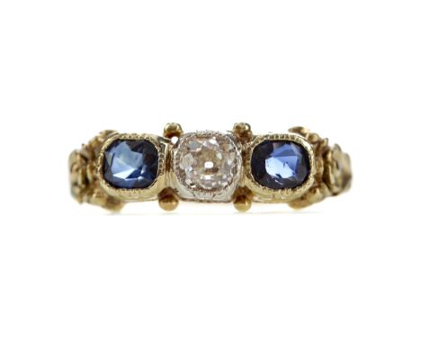 SAPPHIRE AND DIAMOND RING, set with a central Old Mine cut diamond of approximately 0.23 carats flanked by two cushion shaped