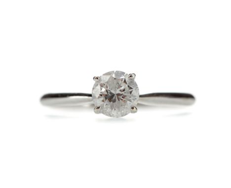 DIAMOND SOLITAIRE RING, set with a round brilliant cut diamond of approximately 0.90 carats, marked 375, size Q, 1.5g