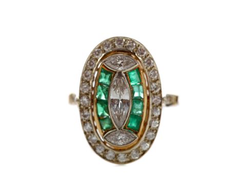 EMERALD AND DIAMOND RING, set with three central marquise shaped diamonds flanked by step cut emeralds, within a border of ro
