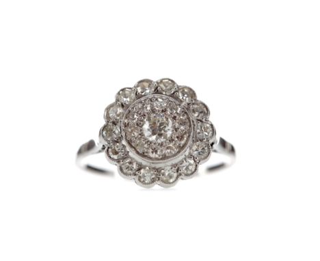 DIAMOND DRESS RING, set with Old European cut diamonds totalling approximately 0.72 carats, unmarked, size K 1/2, 3.2g