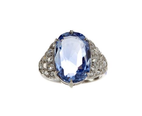 CERTIFICATED UNHEATED CEYLON SAPPHIRE AND DIAMOND RING, the cushion cut Ceylon sapphire of approximately 8.46 carats with acc