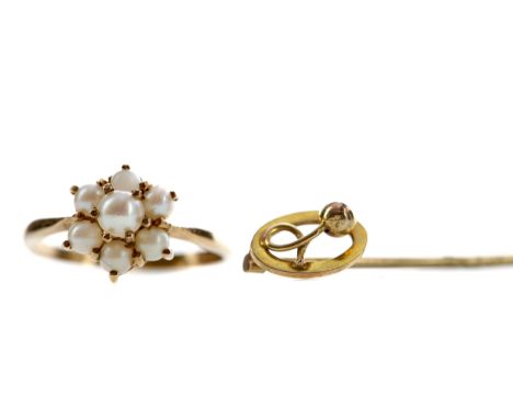 PEARL RING, in the form of a flower, in nine carat gold, size L 1/2, along with a stick pin marked 9CT to the head, 2.5g gros