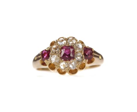 RUBY AND DIAMOND RING, set with three cushion cut rubies totalling approximately 0.59 carats and rose cut diamonds totalling 