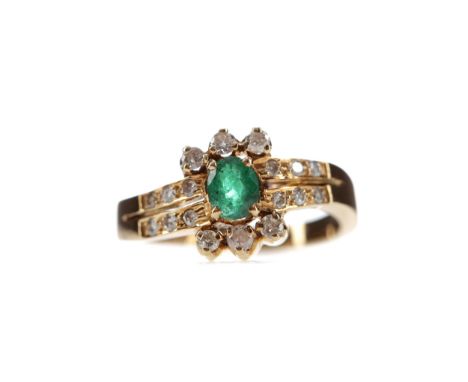GREEN GEM SET AND DIAMOND RING, set with an oval green gem bordered by round brilliant cut diamonds totalling approximately 0