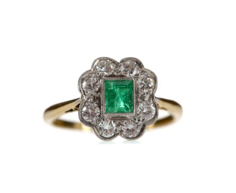 EMERALD AND DIAMOND RING, set with a step cut emerald of approximately 0.41 carats within a halo of round brilliant cut diamo