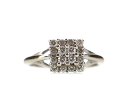 DIAMOND CLUSTER RING, set with round brilliant cut diamonds totalling approximately 0.40 carats, in eighteen carat white gold