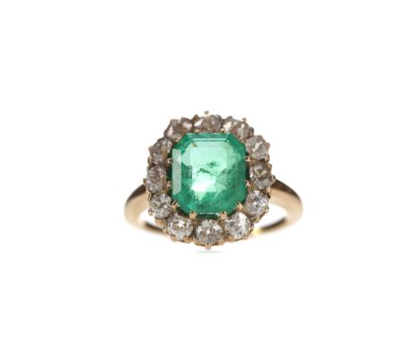 CERTIFICATED COLOMBIAN EMERALD AND DIAMOND RING, set with an octagonal cut Colombian emerald of approximately 3.03 carats, wi