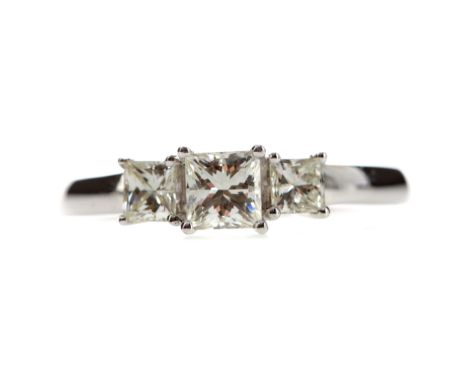 DIAMOND THREE STONE RING, set with princess cut diamonds totalling approximately 0.75 carats, in eighteen carat white gold, s