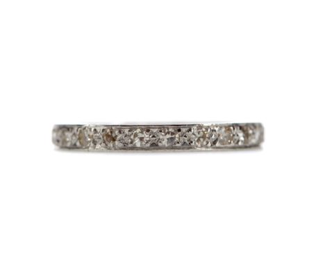 DIAMOND ETERNITY RING, set with round brilliant cut diamonds totalling approximately 0.60 carats, marked PLAT, size O 1/2, 3.