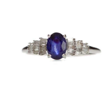 SAPPHIRE AND DIAMOND RING, set with an oval sapphire flanked by baguette cut diamonds on tiered shoulders, marked 9K, size Q,
