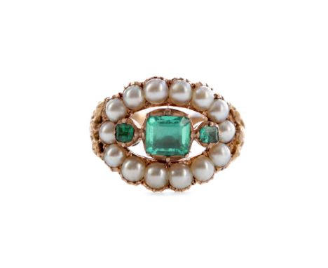 EMERALD AND PEARL RING, set with a step cut emerald flanked by two smaller emeralds totalling approximately 0.58 overall, wit