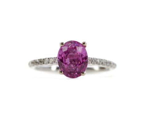 PINK SAPPHIRE AND DIAMOND RING, set with an oval pink sapphire of approximately 2.94 carats, with round brilliant cut diamond