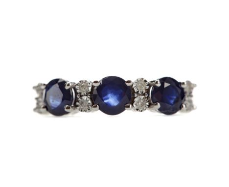 SAPPHIRE AND DIAMOND RING, set with round sapphires totalling approximately 1.91 carats, interspaced by pairs of illusion set