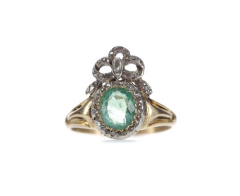 EMERALD AND DIAMOND RING, set with an oval emerald of approximately 0.98 carats within a halo of rose cut diamonds, beneath a