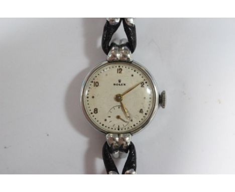 Rolex - a lady's steel cased wristwatch, the circular silvered dial signed 'Rolex' with alternate Arabic and bead markers, su