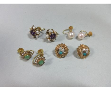 Four pairs of pearl and gemset screwback or clip earrings, the first of pierced flowerhead form and hallmarked 9ct gold, each