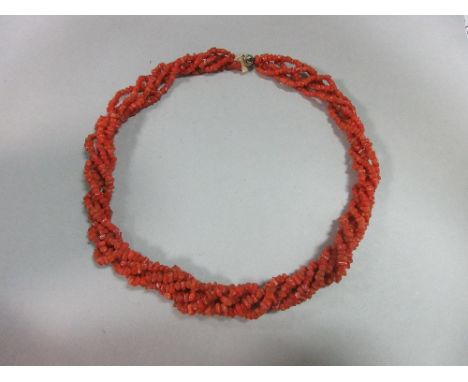 A vintage five strand coral bead necklace, each bead a short length of branch coral, graduated in size, length 50cm  