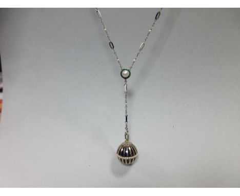 An enamel and diamond pendant watch suspended from a fancy link enamel and seed pearl necklace, the unmarked Swiss movement t