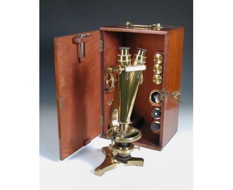 A good 19th century lacquered brass binocular microscope by R. & J. Beck, No. 19432, with rack and pinion focusing, circular 
