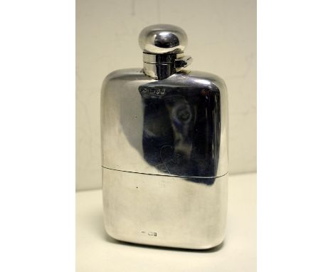 An Edwardian silver brandy flask, by Colen Hewer Cheshire, Chester 1903, of plain rectangular shape and curved section, with 