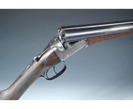 Army & Navy CSL, a 12 bore boxlock ejector gun, No. 14134, the 30" barrels with dolls head top extension, the frame with scro