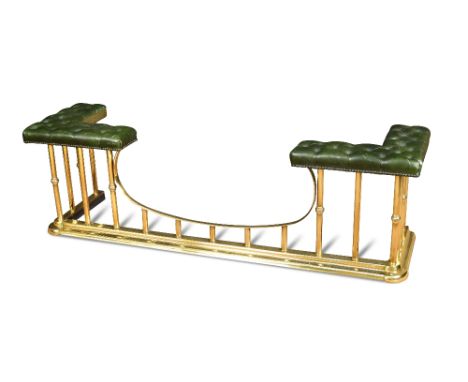 A 19th Century brass rail club fender, with sunk centre and green button leather upholstered corner seats, inside measurement