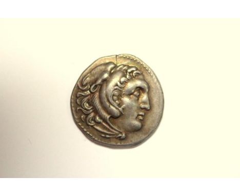 Macedonian Kingdom, Alexander III, silver drachm, obverse head of Herakles right wearing a lion's skin headress, reverse Zeus