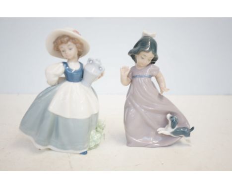 2x Nao figures of young girls 