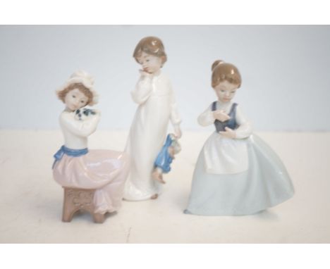 3x Nao figures of young girls 