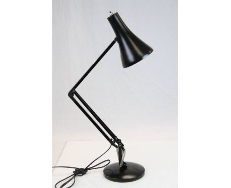 A 20th century anglepoise lamp .