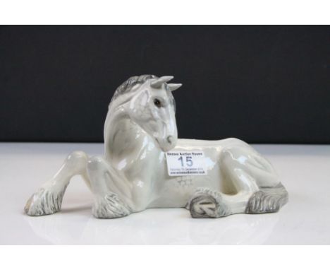 Beswick ceramic model of a Grey Shire Horse lying down, number 2459