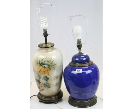 Blue ground ginger jar style lidded vase converted to lamp and a contemporary floral decorated lamp 