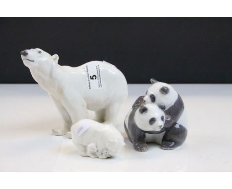 Three Royal Copenhagen ceramic Animals to include; Polar Bear, engraved "NN" to foot, pair of Pandas numbered 667, small Pola