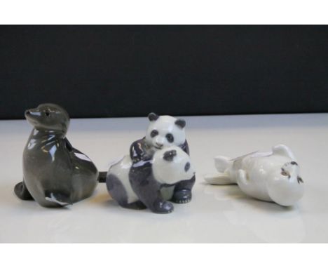 Three Royal Copenhagen ceramic Animals to include; Seal scratching it's ear number 327 (damaged), Seal lying on it's back num