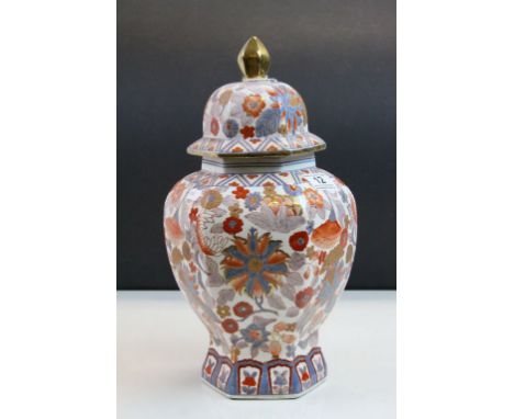 Japanese lidded ceramic Temple type Vase or Urn with Floral decoration &amp; original sales label to base, stands approx 36cm