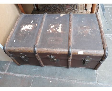 A VINTAGE TRAVEL TRUNK