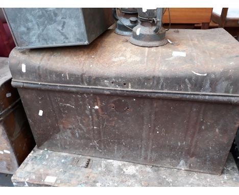 AN OLD METAL TRUNK