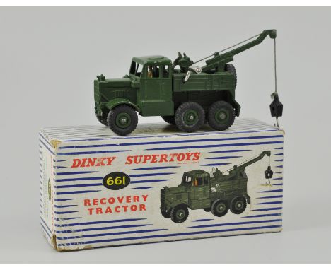 Dinky Toys, 661 Military Recovery tractor, military green body with green hubs, operable crane, in the original blue and whit