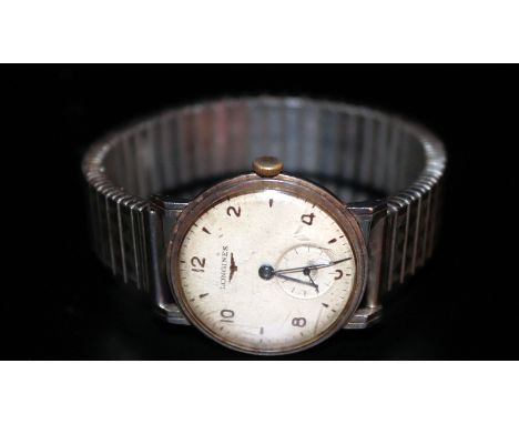 Gents Longines Wristwatch c1940. Early 20thC Stainless Steel Longines Wristwatch, Champagne Dial, Arabic &amp; Baton Numerals