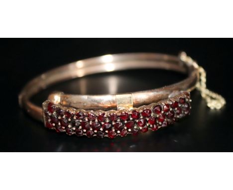 19thC Austrian Gilt Metal Hinged Bangle, The Front Set With Three Rows Of Garnets, Unmarked, Looks To Have Original Silk Line