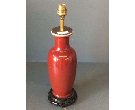 Chinese Sang de boeuf glazed table lamp on stand