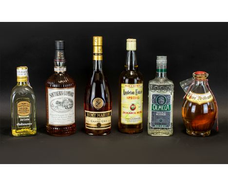 MIXED COLLECTION OF SPIRITS. 1litre Southern Comfort, 70cl Remy Martin (brandy), 750ml Wray &amp; Nephew Apple Estate special