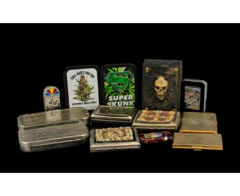 A Mixed Lot of Smoking Accessories to include modern cigarette boxes, lighters, tobacco box, razor box, hip flask etc