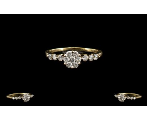 18ct Yellow Gold - Attractive Diamond Set Cluster Ring, Pleasing Flower head Setting, with 6 Diamonds Extending to Shoulders.