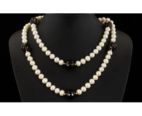 A Cultured Pearl And Topaz Bead Necklace With 14ct Gold Clasp Very long, elegant necklace comprising approx 92 well matched p