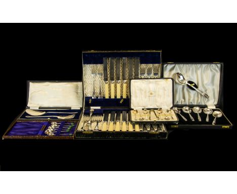  A Collection of Five Boxed Metalware Sets to include a set of six teaspoons with sugar nips by Joseph Beal &amp; Sons of She