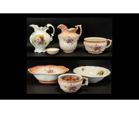 A Collection Of Floral Ceramic Vanity Items To include two large water jugs, soap dish, two chamber pots and two large fluted