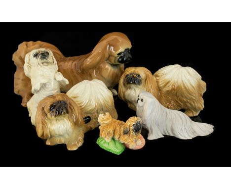 Collection of Six Ceramic Pekingese Dog Figures, including Royal Doulton.  Group of six ceramic dogs, comprising a Royal Doul