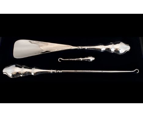 A Cased Silver Handle Shoe Horn And Button Hook Set Fully hallmarked for Birmingham, 1911, Silk Lined Fitted Case