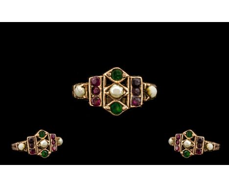 Regency Period 15ct Rose Gold Emerald, Ruby And Seed Pearl Ring Of Graduated design with central seed pearl between two emera